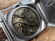 Load image into Gallery viewer, Bulova c.1932 in Tonneau Clam Case with Original Metal Bracelet, Manual, 26.5x36.5mm