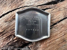 Load image into Gallery viewer, Illinois 'Ensign' Black Dial with White Markings and Light Amber Lume Numbers, Manual, 28x34mm