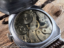 Load image into Gallery viewer, Bulova All Original Stellar Steel Dial with Stain Glass Style Hands in a Crisp Deco Tonneau-Style Case, Manual, 28mmx36mm
