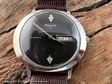 Load image into Gallery viewer, Bulova 23 Jewel Black Dial, Day/Date in Oval Case, NOS, Automatic, 38x33mm