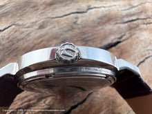 Load image into Gallery viewer, Bulova 23 Jewel Black Dial, Day/Date in Oval Case, NOS, Automatic, 38x33mm