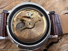Load image into Gallery viewer, Bulova 23 Jewel Black Dial, Day/Date in Oval Case, NOS, Automatic, 38x33mm