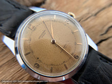 Load image into Gallery viewer, Universal Geneve Salmon Patina Dial with Elegant Gold Hands, Bumper Automatic, 35mm