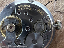Load image into Gallery viewer, Bulova Parchment Patina with Decorative Built Out Sides , Manual, 28x38mm
