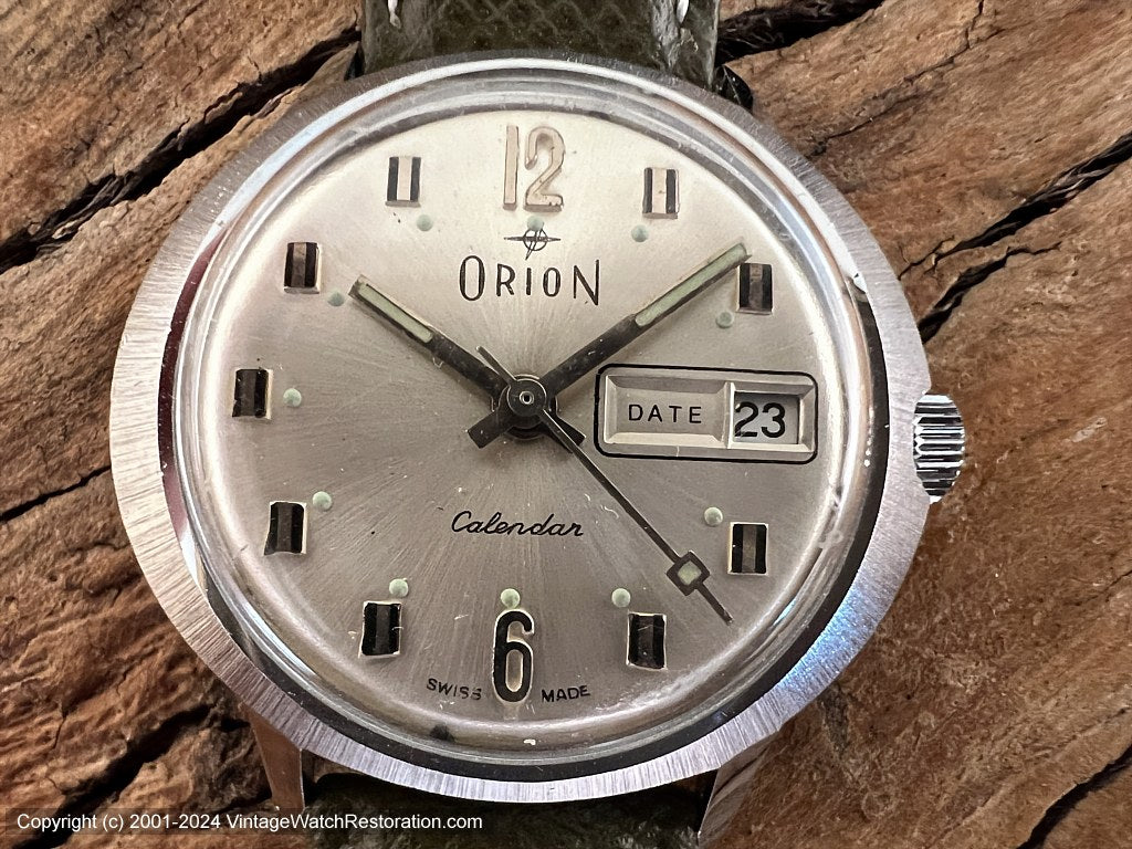 Orion Calendar Perfect Champagne Dial in Brushed Oval Case Automatic 39x34.5mm