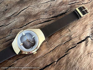 Sicura Rounded Square Gray Dial with White Trim in a Hefty Golden Case, Electronic, 36x48mm