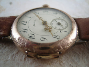 Very early Elgin rose gold wristwatch with decorative motifs, Manual, 35.5mm