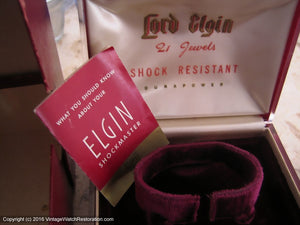 Elgin Shockmaster Tortoise Shaped Flared Case with Original Box and Brochure, Manual, 25x37mm